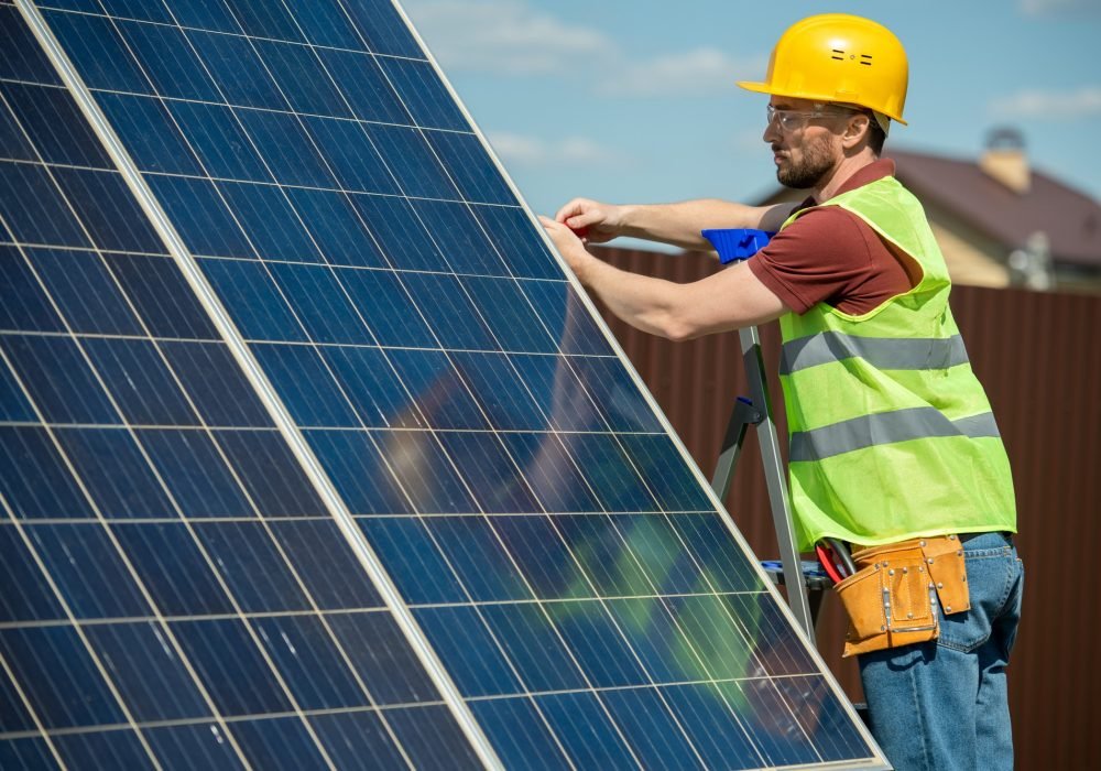 engineer-installing-solar-panel.jpg